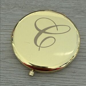 Initial “C” Compact